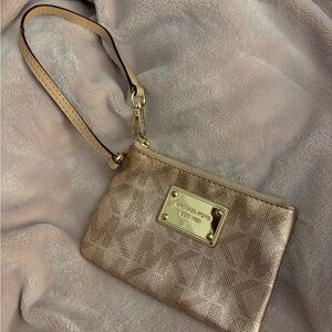 Michael Kors Metallic Rose Gold Wristlet Clutch with Logo Plate